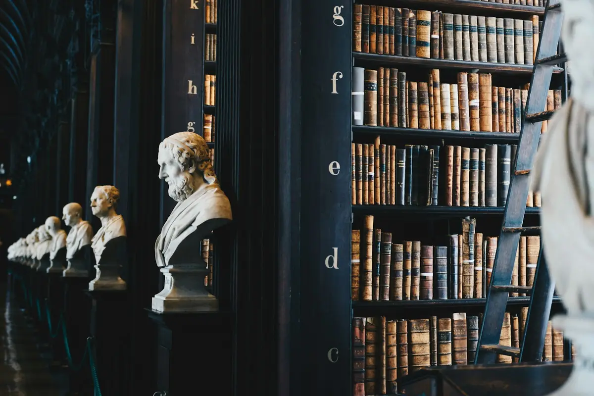 Rows of old law books on library shelves
