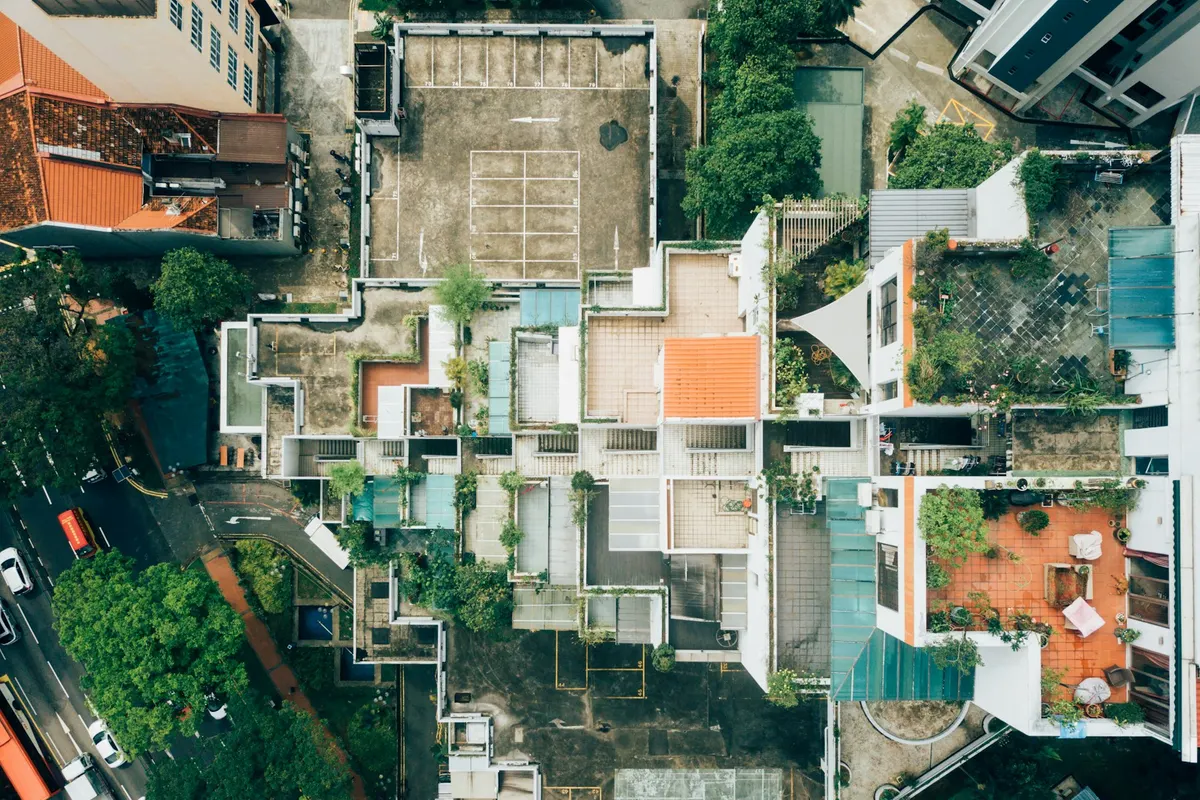 Aerial view of closely built houses with rooftop terraces