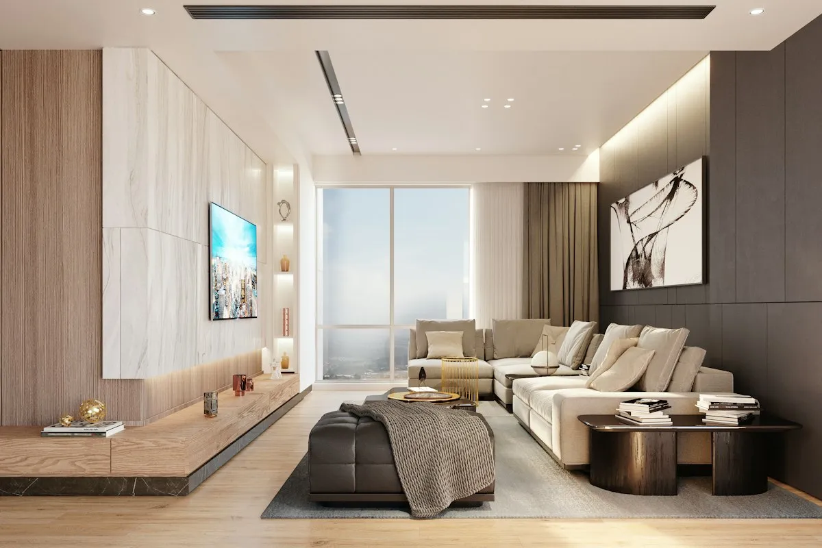 A modern living room with a sectional sofa and a large window