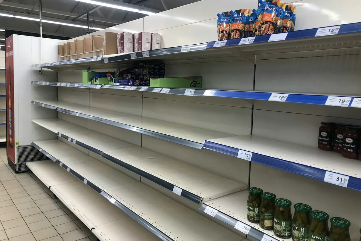 Long retail shelves in a shop
