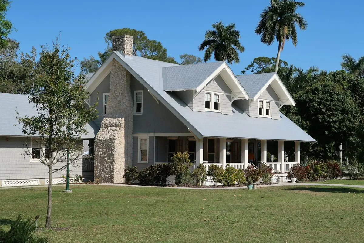 A two-storey house with a garden
